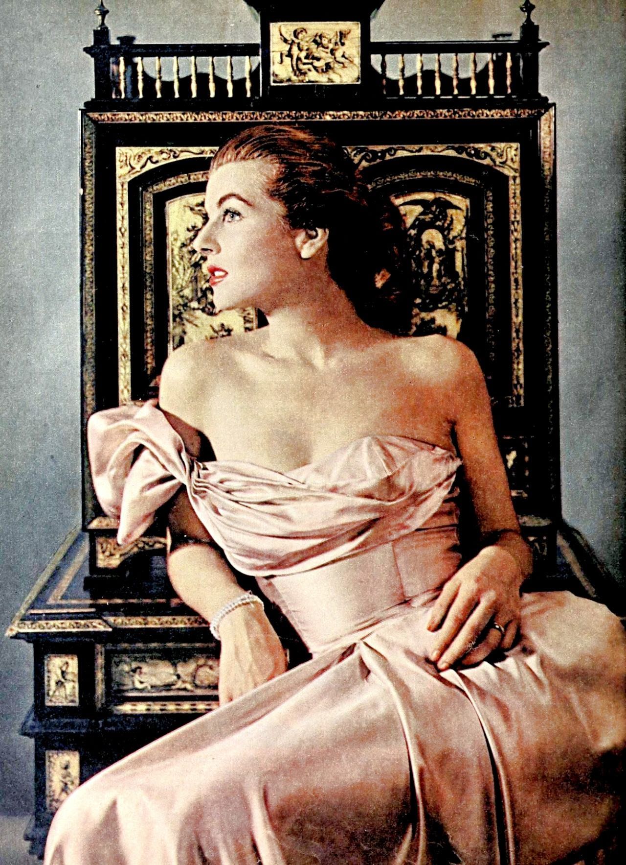 Corinne Calvet in a dress by Ceil Chapman, Photoplay, Dec.1949