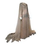 Tony Ward Fall 2025 Sheer Tulle Beaded ad Crystal Gown w/Waterfall Sleeves, slight side