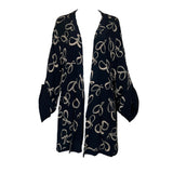 Early 1940's Ribbon Bow Print Black Silk Georgette Jacket, cuffed