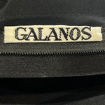 Galanos 1984 Black Silk Tiered Gown with Decorative Hip Flower, label