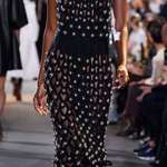 Look 28 Alaia Winter 2022 Black Hooded Net Jersey Dress with Chrome Bauble Studs, runway