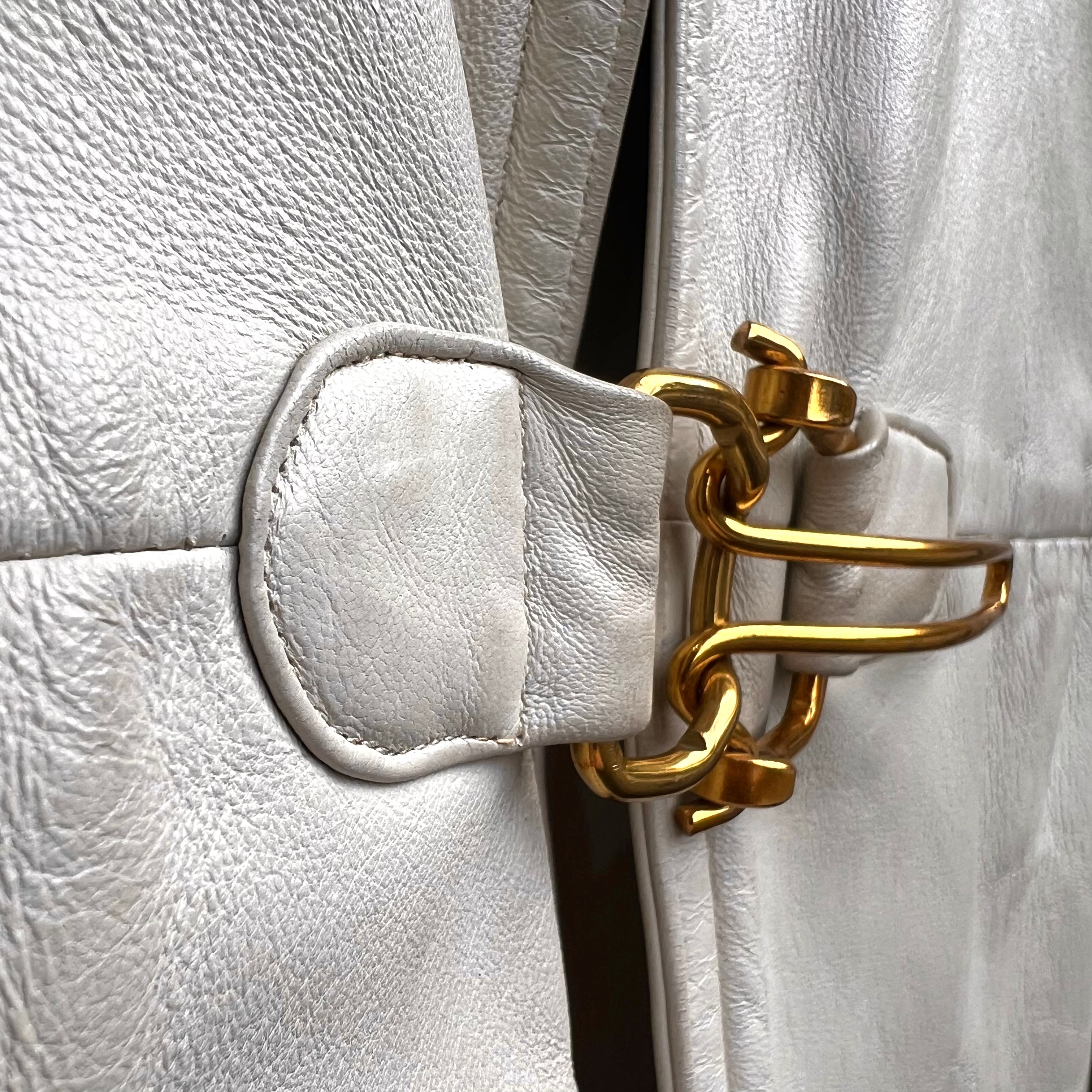 Bonnie Cashin for Sills Late Late 1960's Taupe Beige Leather Cape with Brass Hardware, brass closure