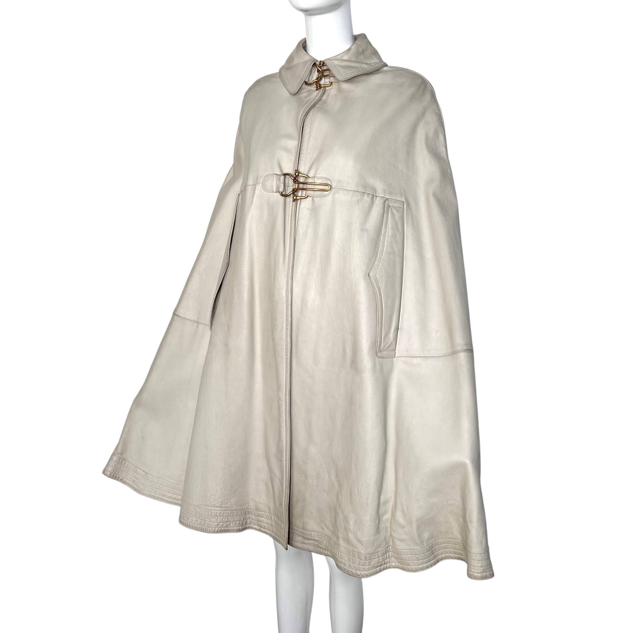 Bonnie Cashin for Sills Late Late 1960's Taupe Beige Leather Cape with Brass Hardware, slight side