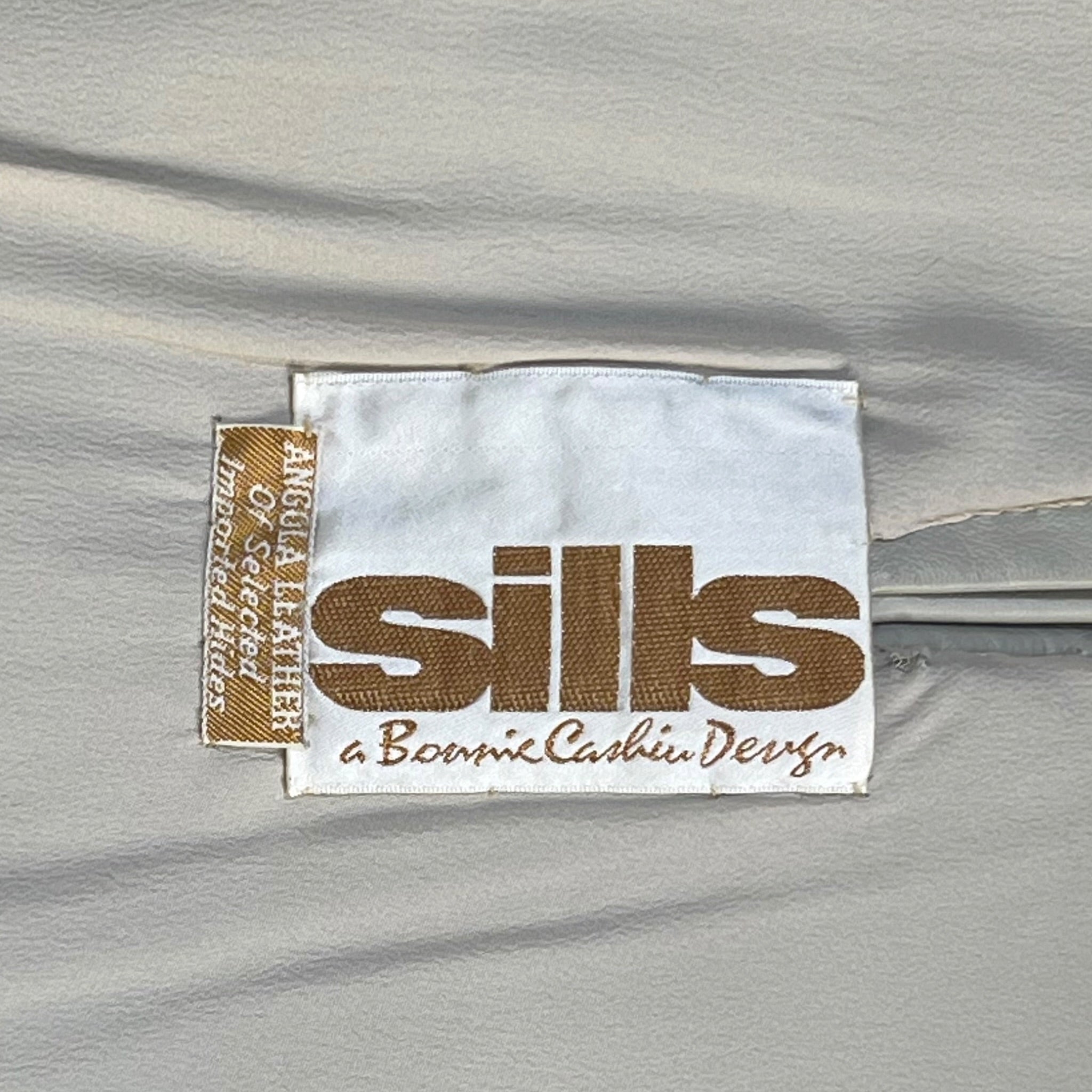 Bonnie Cashin for Sills Late Late 1960's Taupe Beige Leather Cape with Brass Hardware, label