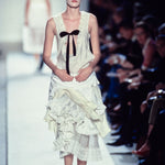 Comme des Garçons S/S 2002 Cream and White Layered Ruffled Buckle Wrap Skirt, runway 2