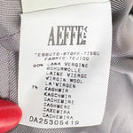 Moschino Couture 1990's Grey "Secret Desire" Skirt Suit, tag 2