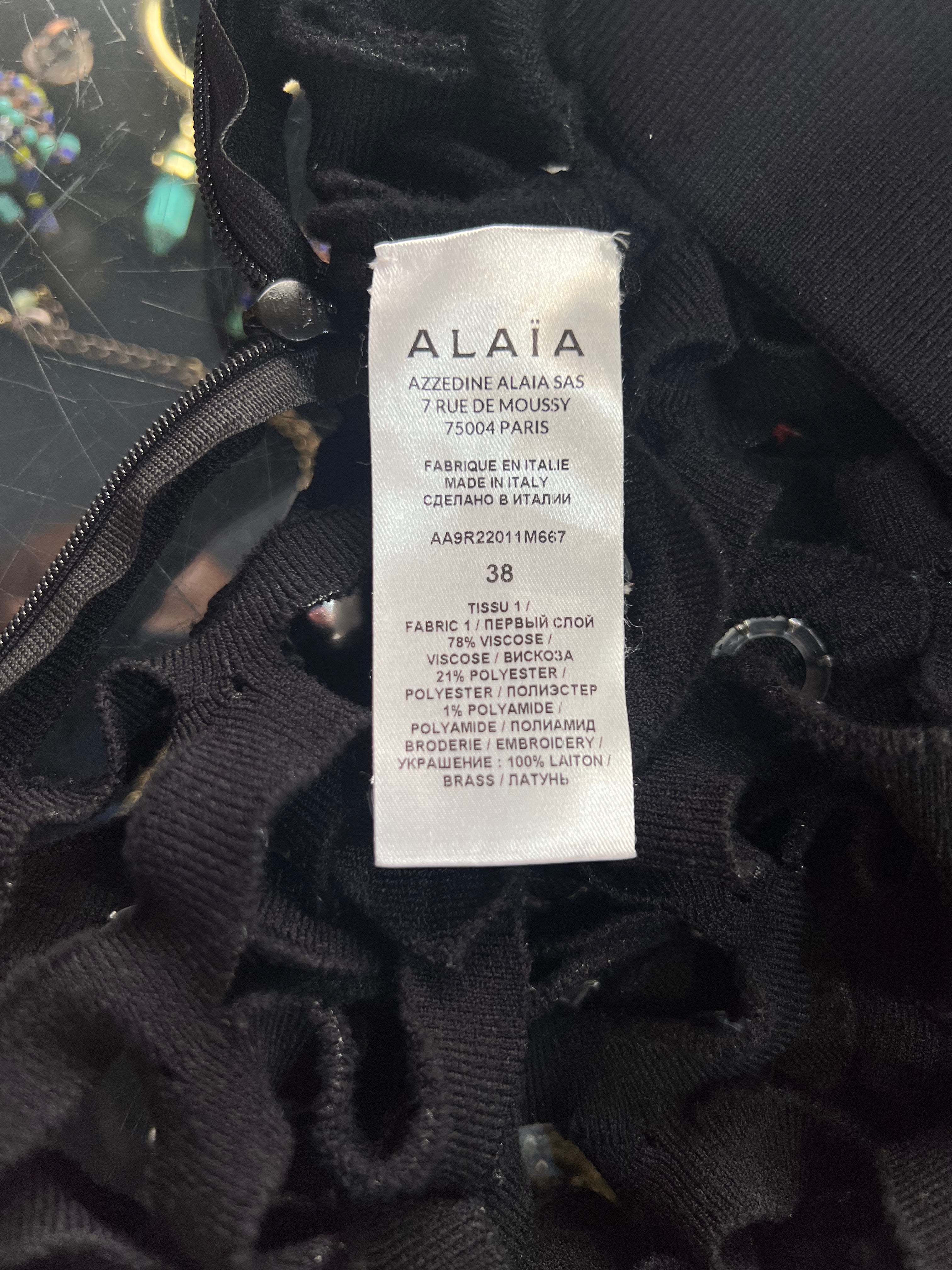 Alaia Winter 2022 Black Hooded Net Jersey Dress with Chrome Bauble Studs, label