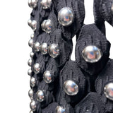 Alaia Winter 2022 Black Hooded Net Jersey Dress with Chrome Bauble Studs, close up 