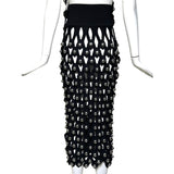 Alaia Winter 2022 Black Hooded Net Jersey Dress with Chrome Bauble Studs, skirt back