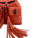 Gucci Orange Leather Backpack with Bamboo Handle and Fringe Tassels, left pocket