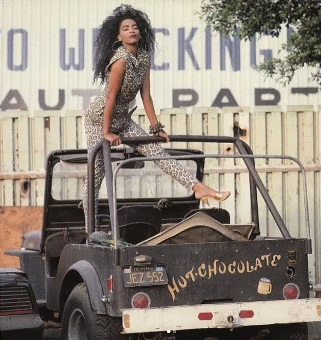 Jody Watley in a Jean Paul Gaultier (Spring/Summer 1989) leopard print denim waistcoat and jean set for her tour book photo shoot (1989