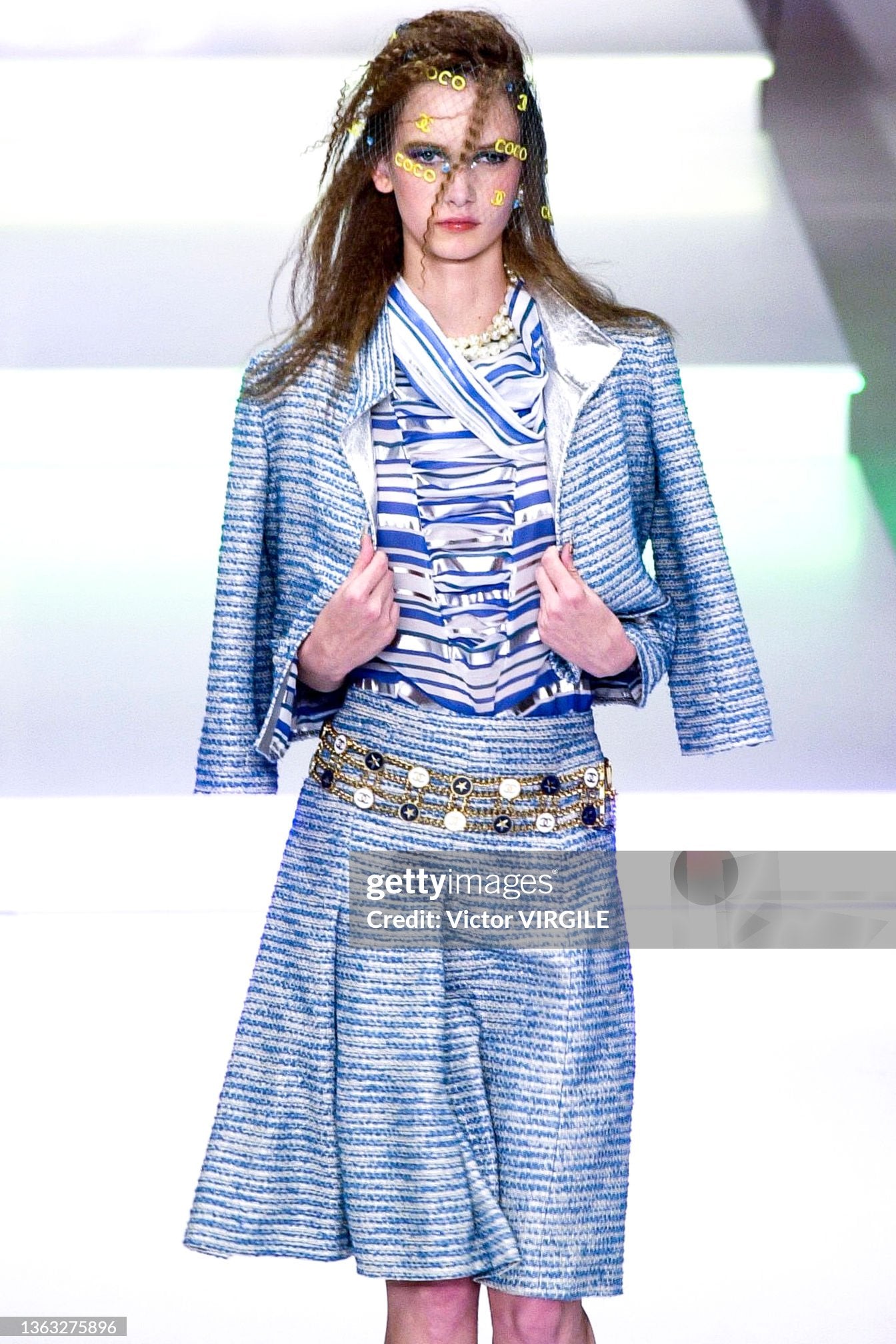 Chanel - Runway - Spring/Summer 2001 Paris Fashion Week
PARIS, FRANCE - OCTOBER 12: A model walks the runway during the Chanel by Karl Lagerfeld Spring/Summer 2001 fashion show as part of the Paris Fashion Week on October 12, 2000in Paris, France. (Photo by Victor VIRGILE/Gamma-Rapho via Getty Images)