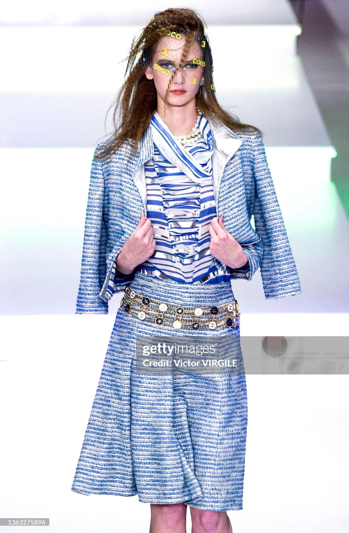 Chanel - Runway - Spring/Summer 2001 Paris Fashion Week
PARIS, FRANCE - OCTOBER 12: A model walks the runway during the Chanel by Karl Lagerfeld Spring/Summer 2001 fashion show as part of the Paris Fashion Week on October 12, 2000in Paris, France. (Photo by Victor VIRGILE/Gamma-Rapho via Getty Images)