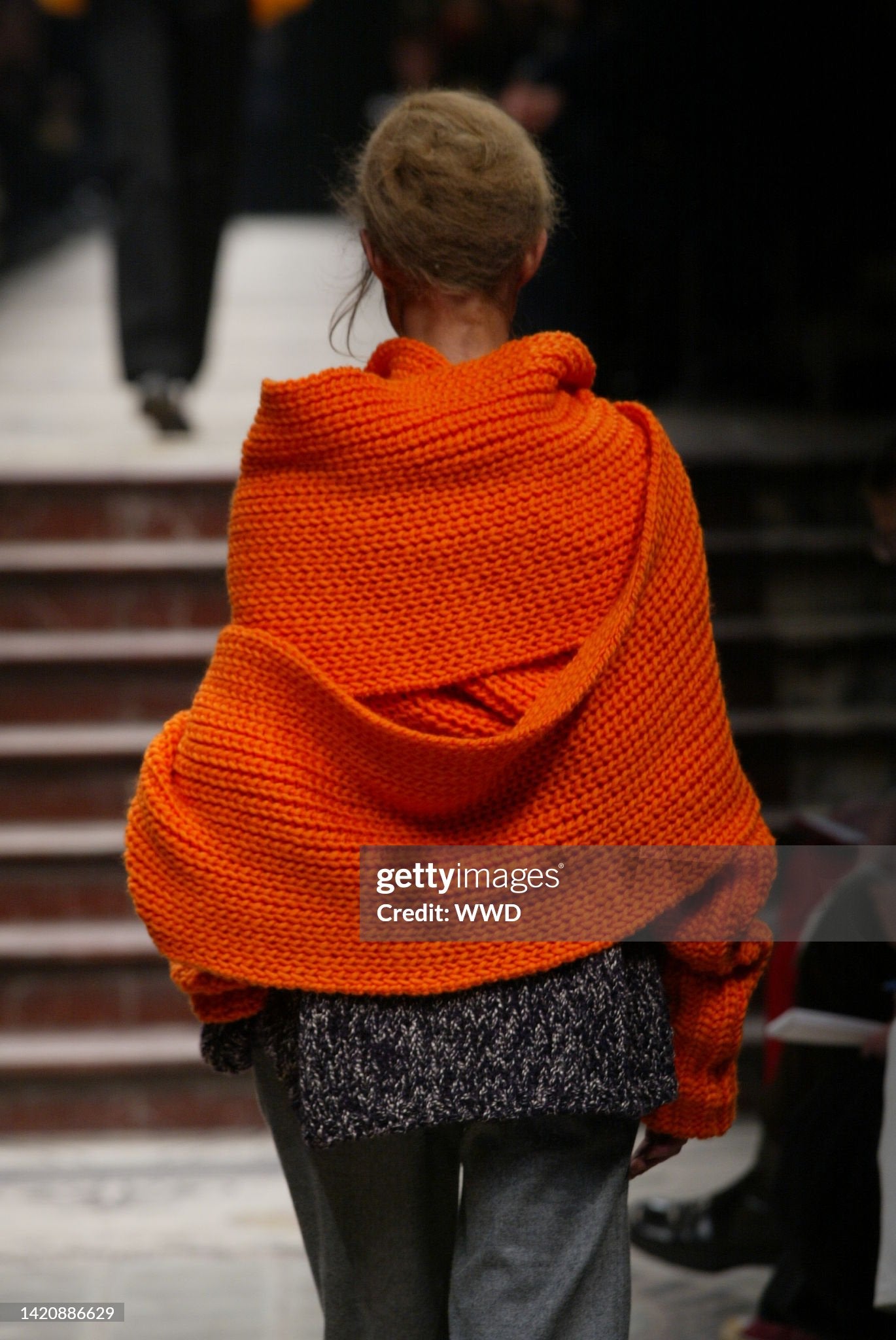 
Yohji Yamamoto Fall 2002 RTW
A model on the runway at the Fall 2002 Yohji Yamamoto fashion show. (Photo by Giovanni Giannoni/WWD/Penske Media via Getty Images) back