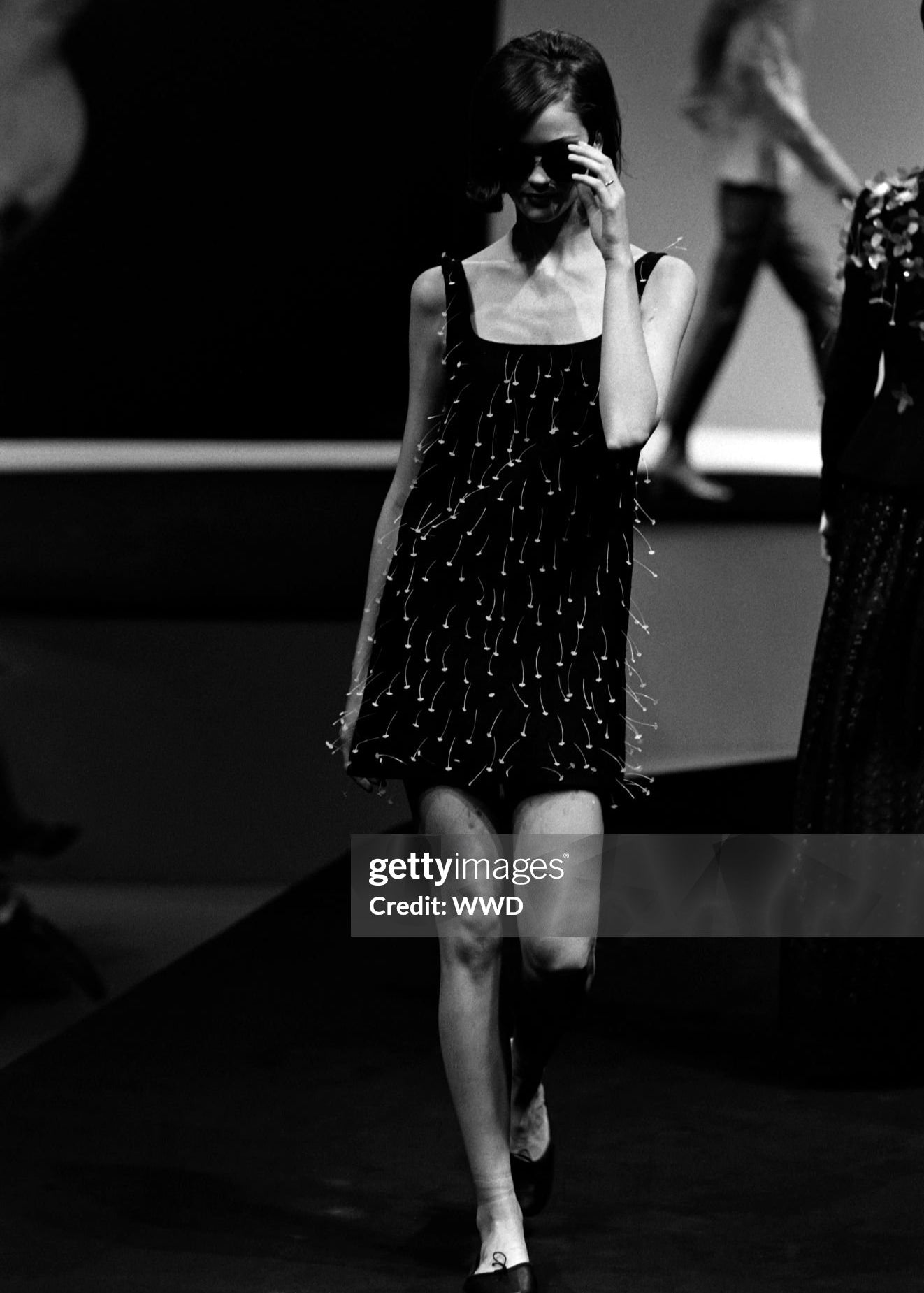 A model walks in the Moschino Spring 1996 Ready to Wear Runway Show on October 9, 1995, in Milan, Italy