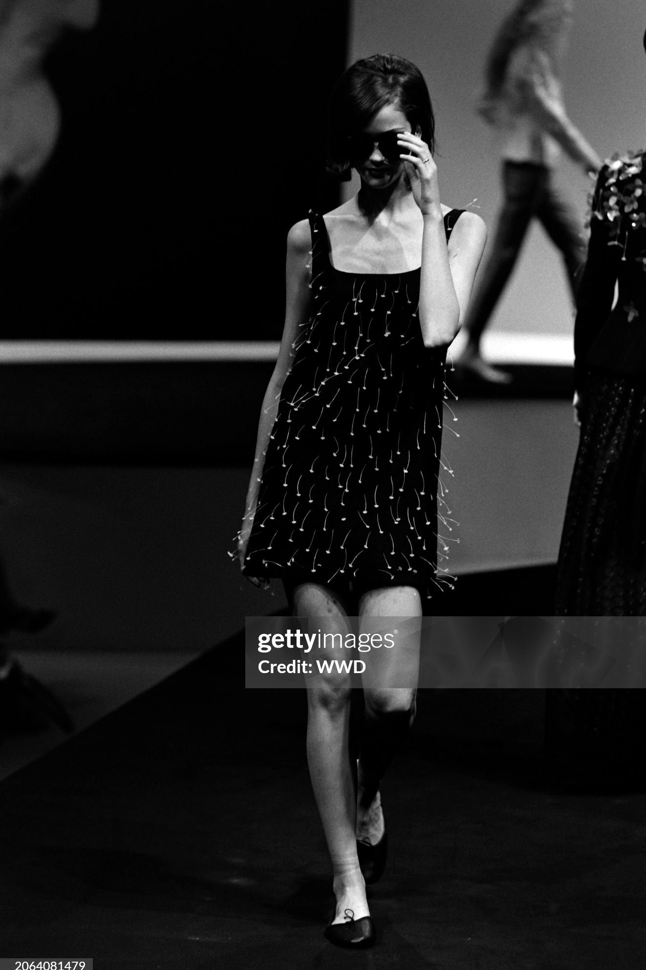 A model walks in the Moschino Spring 1996 Ready to Wear Runway Show on October 9, 1995, in Milan, Italy
