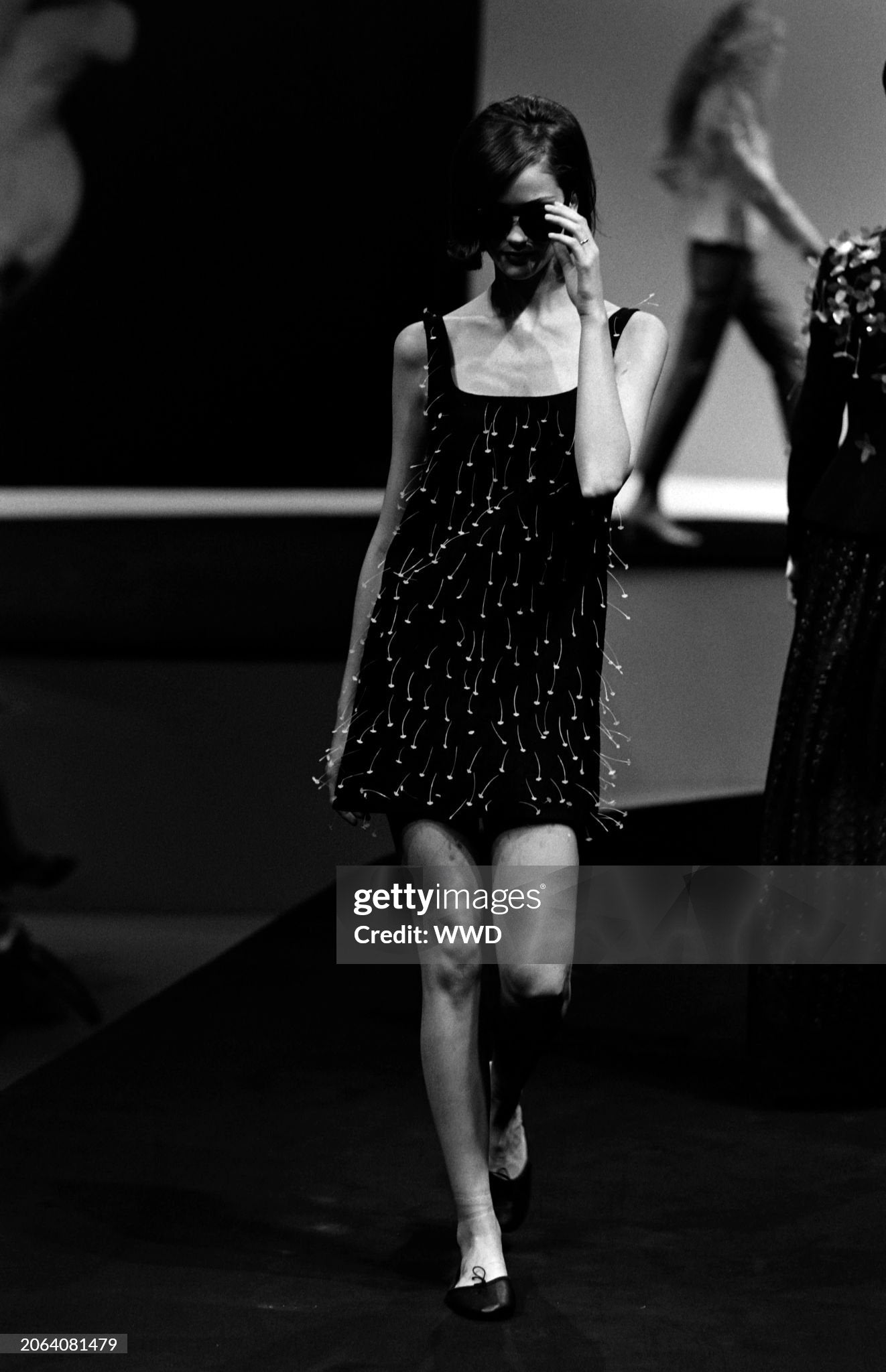 A model walks in the Moschino Spring 1996 Ready to Wear Runway Show on October 9, 1995, in Milan, Italy