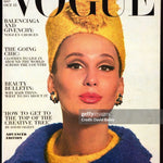 Vogue Magazine Cover - 1963
UNITED STATES - OCTOBER 15: Vogue black logo; Model Brigitte Bauer in purple (blue) tweed coat with yellow pillbox hat by Christian Dior (Photo by David Bailey/Conde Nast via Getty Images)