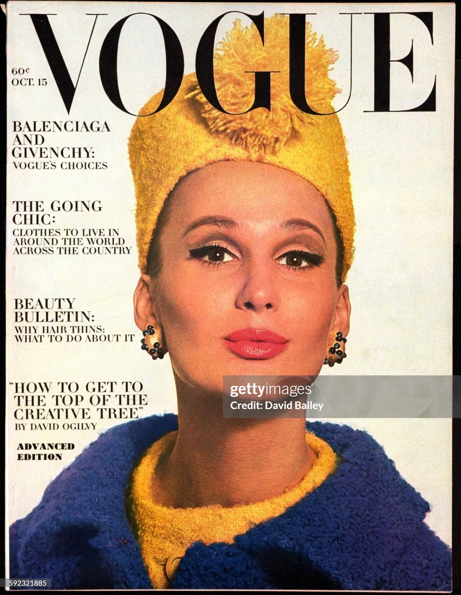 Vogue Magazine Cover - 1963
UNITED STATES - OCTOBER 15: Vogue black logo; Model Brigitte Bauer in purple (blue) tweed coat with yellow pillbox hat by Christian Dior (Photo by David Bailey/Conde Nast via Getty Images)