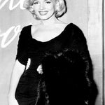 Marilyn Monroe, in a Ceil Chapman dress, December 1953