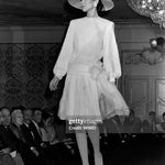 Galanos 1984 Black Silk Tiered Gown with Decorative Hip Flower, Getty image of runway